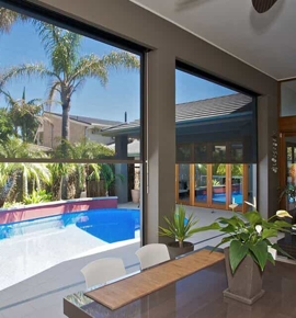 Exterior shades by pool and outside sitting area Photo
